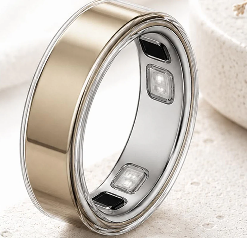 Close view of a clear TPU cover seated evenly around the outer edges of a gold Oura Ring 5