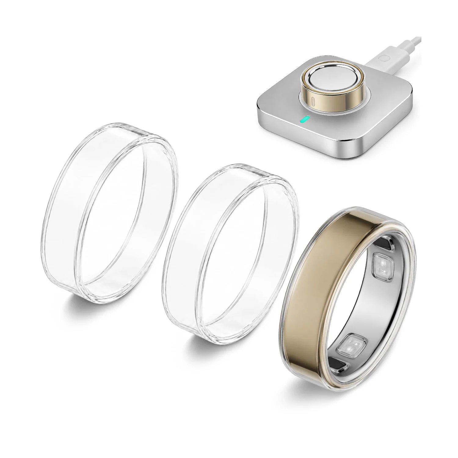 Three clear Sylacor TPU covers beside a covered gold Oura Ring 5 and its charger