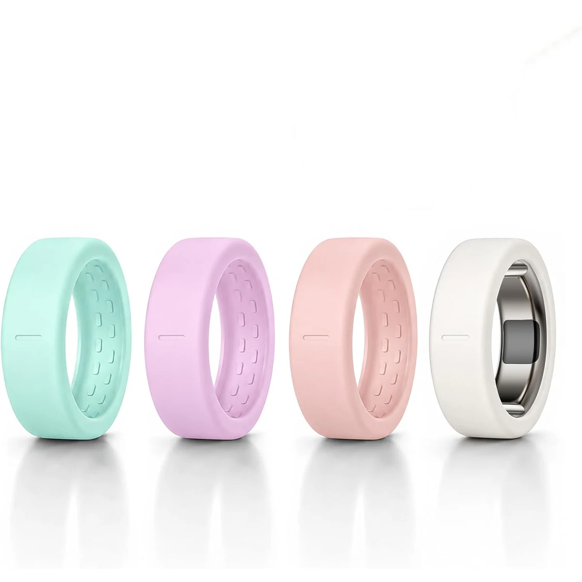 Four mint, lavender, pink, and white Sylacor silicone covers for Oura Ring 5